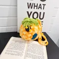Mini-Ananas-Häkeltasche mit gelbem Ananas-Haus-Design und grünem Blattdetail - Gelb