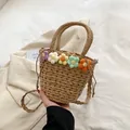 Elegante borsa in paglia intrecciata con fiori colorati ideale per le vacanze estive - Kaki