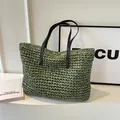 Handcrafted grass green woven tote bag with contrast brown leather handles - Green