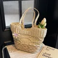 Two-tone woven straw tote bag in beige and brown with purple butterfly charm - Beige
