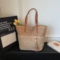 Sac fourre-tout en paille tissée évidée avec surpiqûres color-block et détails pompons - Kaki