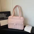 Light pink quilted laptop tote bag with vertical stitching and front flap pocket - Pink