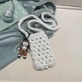 White woven cotton hollow crossbody mini bag with brown doll charm and strap - Without Pendant / Off White