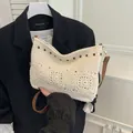 Bohemian cream woven crossbody bag with brown accent beads and adjustable leather strap - Off White