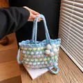 Borsa a tracolla all'uncinetto celeste con motivi floreali e ciondolo a fiore 3D - Grande / Blu