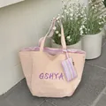 Minimalistische pfirsichfarbene Tragetasche mit GSHYA-Druck und gestreifter Zubehörtasche - Eiscreme Rosa