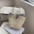Borsa tote in paglia estiva con fiocchi vichy e manico intrecciato per la spiaggia - Beige