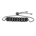 Macro detail of gunmetal cuban link bracelet with black pavé micro-inlaid zircons - Gunmetal