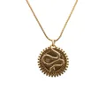 Gold coin necklace with embossed snake pendant and micro-set zircon on white background - Relief Snake Medallion / Box Chain