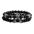 Conjunto de pulseras para hombre con cuentas negras y dijes de corona plateados - Set 1