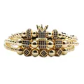 Close-up of three-layer gold beaded bracelet set with blue zircon crown and charms - Gold Blue Zircon Bundle