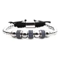Close-up of beaded bracelet with blue cubic zirconia charms and adjustable black cord - Silver Blue Zirconia Wheel Beads