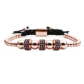 Detail of rose gold beaded bracelet featuring micro-pave blue stones and adjustable drawstring - Rose Gold Blue Zirconia Wheel Beads
