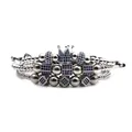 Close-up of crown charm and blue zircon inlay beads on silver steel bracelet set - Silver Blue Zircon Bundle