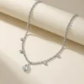 Bohemian silver rhinestone bridal headpiece featuring a pear-shaped crystal droplet - Silver