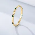 Macro detail of gold S925 sterling silver ring with green zircon stones and 925 hallmark - US 5 / Green Zircon