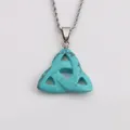 Macro view of Celtic Triquetra pendant with turquoise stone texture on silver chain - Turquoise Pattern (NSN00065)