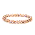 Sparkling 8mm champagne pink faceted crystal bead bracelet with iridescent AB coating - Yellow