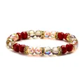Rote facettierte Perlenarmband mit AB-Kristallen und vergoldeten Strass-Zwischenringen - 8mm / Burgunderrot