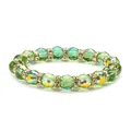 Sparkling green faceted crystal glass bead bracelet with gold rhinestone spacers on white background - 10mm Green