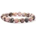 Perlenarmband aus rosa Zebra-Jaspis mit goldenen Strass-Zwischenstücken und Naturstein - 10mm / Rosa Zebra Glänzend