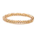 Sparkling 6mm champagne crystal glass beaded bracelet with faceted surface on white background - Champagne Gold Style / Yellow