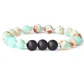 Natural light blue imperial stone bracelet with black lava rock beads and silver spacers - Shoushan Stone & Black Lava Stone