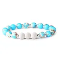 Beaded stretch bracelet featuring emperor stone and white lava rock with silver spacers - Blue Emperor Stone & White Lava Stone