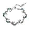 Boho-Silberarmband mit schillernden Halbmonden aus Muschel und hohlen Sternanhängern - Mond