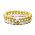 Lava rock couple bracelet set in vibrant yellow and white beads with porous texture - Yellow