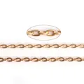 Polished gold O-chain necklace link with macro detail of oval ring connection - 3x2mm / Gold