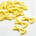 Handmade bright yellow satin ribbon bows for DIY hair accessories and craft supplies - 4cm x 2.5cm (25 Pieces/Pack) / Yellow