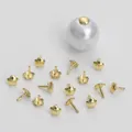 14K gold plated star shaped jewelry finding with pin displayed on a white pearl - 4x6MM