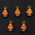 Set di cinque ciondoli a zucca smaltati in oro con motivi colorati di maschere tradizionali - Stile Bestia Divora-Oro / 10x14mm