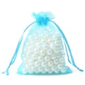Bolsa de organza azul cielo con cordón llena de perlas blancas brillantes para joyería - Aprox. 7*9cm (10 piezas/paquete) / Azul lago