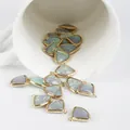 Golden fan-shaped copper pendant with iridescent shell stone for DIY jewelry making - Gray