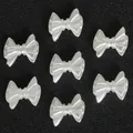 Bow-shaped pearl white resin charms for DIY jewelry and nail art decoration - Artificial Pearl Perforated Bowknot (Beige) / 11x14mm (100 Pcs/Pack)