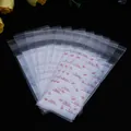 Clear plastic self-sealing lip balm bags with white lace and red bow patterns - 100 Pieces/Pack (5x10+3cm) / Pink Snowflake