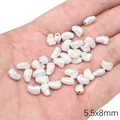Matte silver curved bean spacer beads 5.5x8mm for handmade DIY jewelry making - Straight Hole Embossed Pebble (FGT674) / 1 Piece / Silver