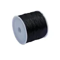 Elastic beaded bracelet string in black color wound on a white spool for DIY jewelry - 0.6 / Black