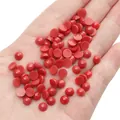 Vibrant red acrylic half-round flatback beads held in hand for DIY doll making - Round Animal Eyes / 6mm (200 Pcs/Pack) / Red