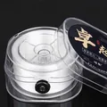 Spool of clear elastic crystal string for DIY jewelry making in a protective round case - Ultra Fine Style (FXT031) / Clear White
