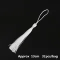 Set of 32 white decorative polyester tassels for bookmarks, approximately 13cm in length - Pure White