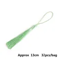 Set of 32 light green polyester tassels, 13cm handmade charms for DIY bookmarks - Mint Green