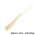 Set of 32 cream white polyester tassels, 13cm length for bookmarks and DIY craft projects - Beige