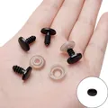 Zwarte veiligheidsogen en ringen voor knuffels, getoond in de hand voor schaal - 9x12mm Ovalen Neuzen met ringen