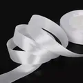 White satin ribbon for DIY handmade roses with glossy finish on black background - EU 38 / White