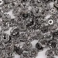 Versilberte gewellte Zwischenperlen mit weißen Kristallen für DIY-Schmuckherstellung - Waffenschwarz Rad Stil (BJA065) / 50 Stück/Packung (Durchmesser 4mm) / Galvanisiert Waffenschwarz Mit Weißem Strass