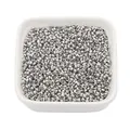 Silver copper crimp beads for jewelry making displayed in a small white bowl - 2mm (100 Pieces/Pack) / White Gold