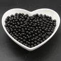 Perles d'imitation noires brillantes en ABS pour bijoux DIY dans un plat en céramique - Noir